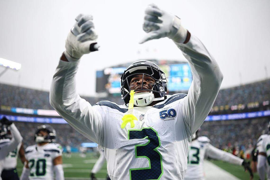CHARLOTTE, NORTH CAROLINA - DECEMBER 28: Nick Emmanwori #3 reacts after Julian Love #20 of the Seattle Seahawks intercepted a pass during the third quarter against the Carolina Panthers at Bank of America Stadium on December 28, 2025 in Charlotte, North Carolina. (Photo by Jared C. Tilton/Getty Images)