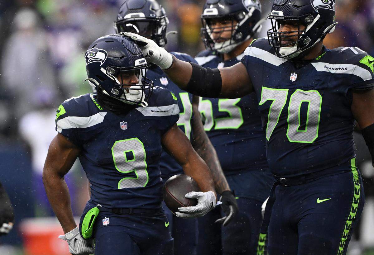 Seattle Seahawks running back Kenneth Walker III (9) reacts to a carry during the first quarter of the first quarter of the game at Lumen Field, on Sunday, Dec. 22, 2024, in Seattle, Wash.