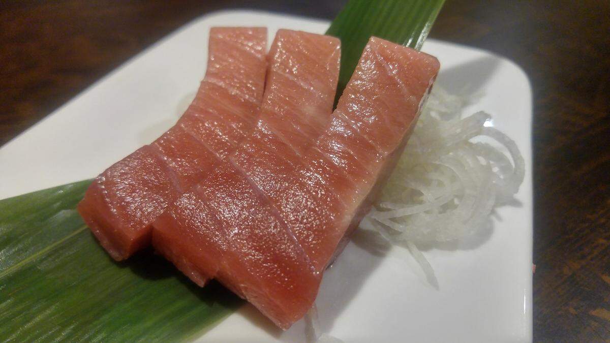 Three wedges of toro, fatty tuna belly, from Sapporo Japanese Steakhouse & Sushi in University Place.
