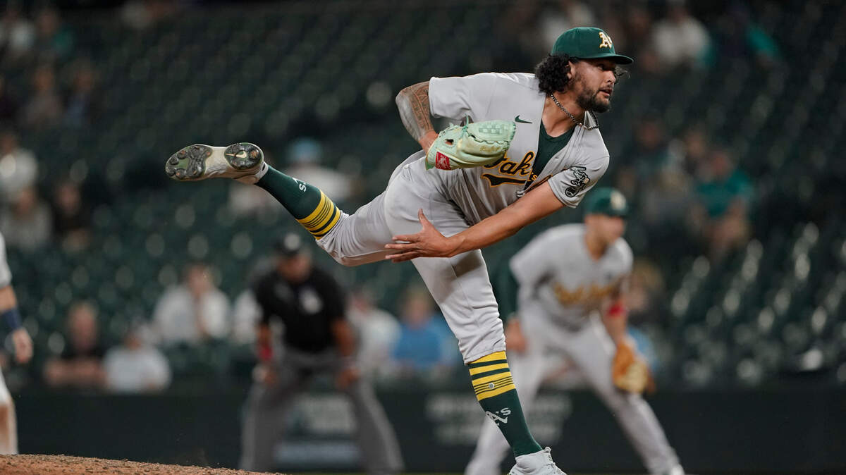 Oakland Athletics starting pitcher Sean Manaea throws to a Seattle Mariners batter during the ninth inning of a baseball game, Wednesday, June 2, 2021, in Seattle. Manea threw a four-hitter as the A’s won 6-0. (AP Photo/Ted S. Warren)