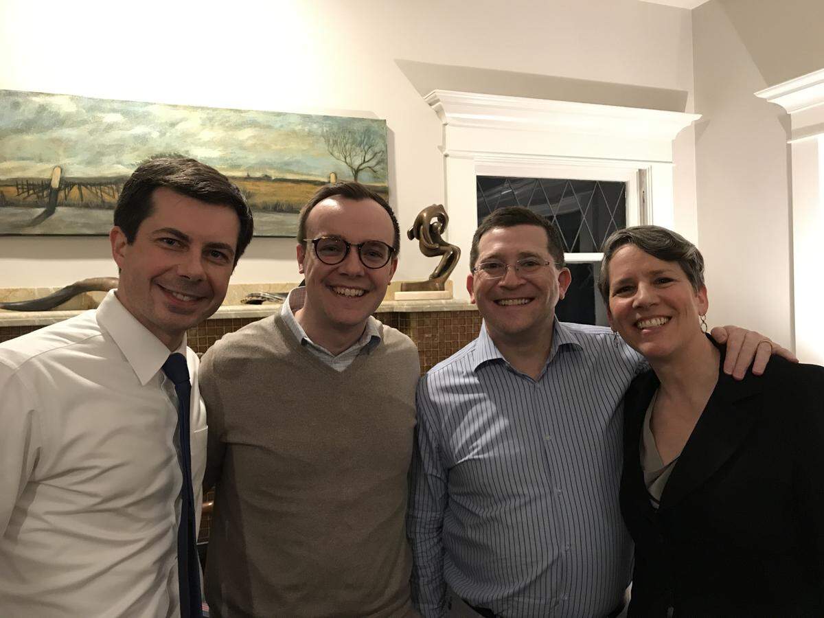 Presidential candidate Pete Buttigieg, his husband, Chasten, with Eric and Suzi LeVine of Seattle. The LeVines in December endorsed Buttigieg for president.