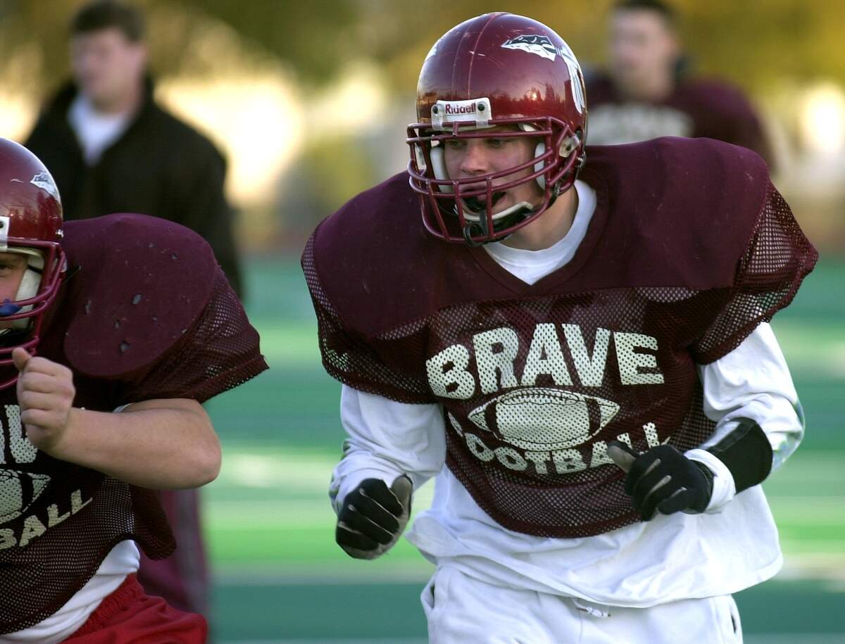 Jeff Parks is shown practicing with the Bethel High School football team in November 2000.