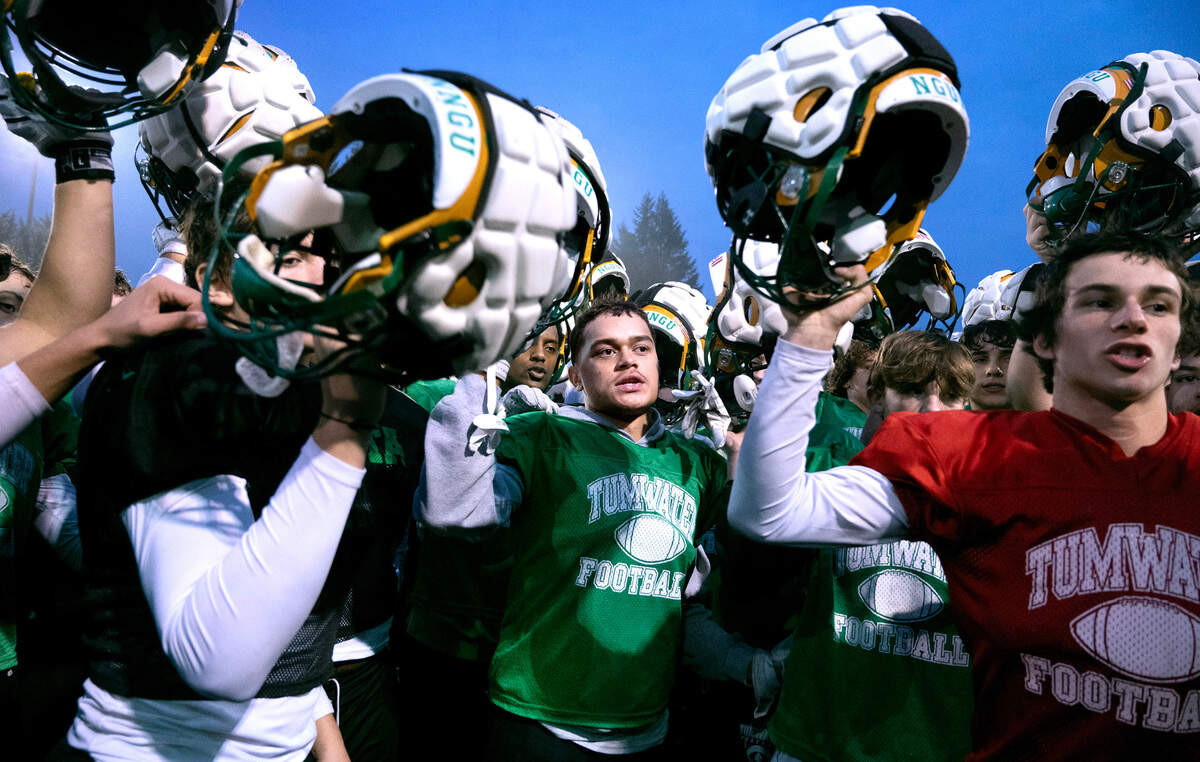 Tumwater senior running back Kooper Clark rallies the T-Birds at the end of football practice at Tumwater District Stadium in Tumwater, Washington, on Wednesday, Nov. 29, 2023.