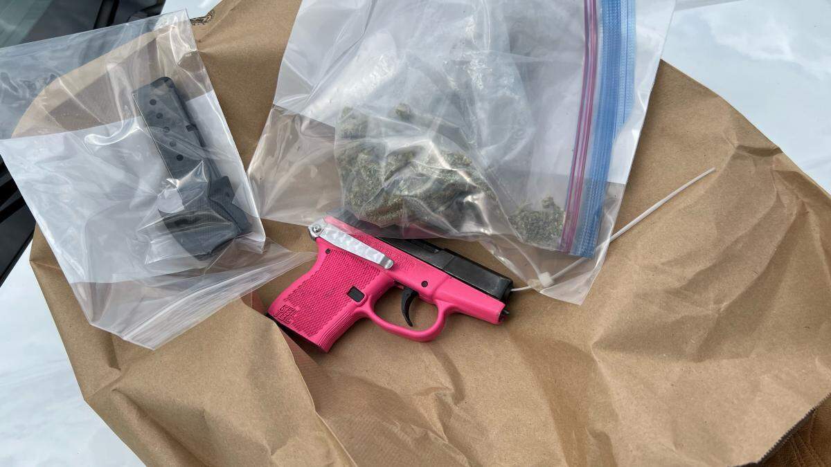 A 15-year-old girl arrested on suspicion of possession of a stolen vehicle was found in possession of a pink handgun, Pierce County deputies said. Also seized was a bag of marijuana.