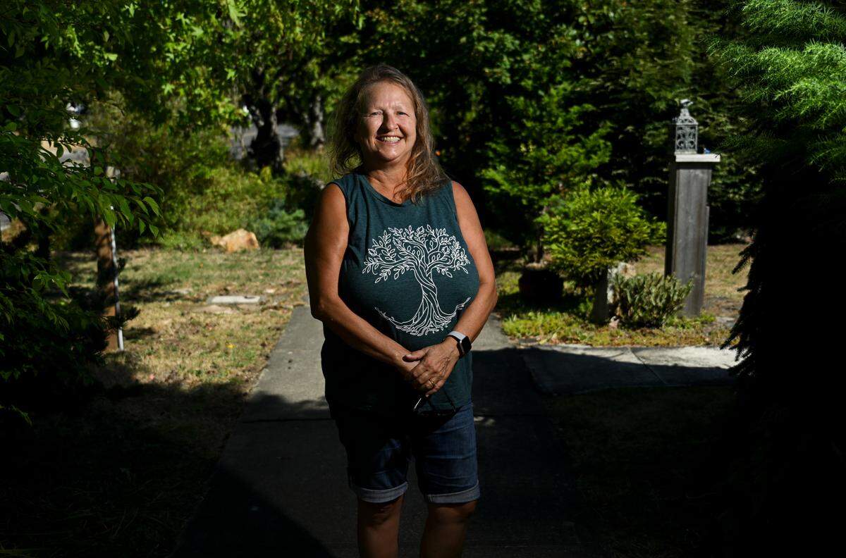 Vivian deZwager, a Tacoma Tree Foundation board member and community member involved in increasing the Tacoma Mall neighborhood’s canopy cover poses for a photo at home, Tuesday, Aug. 15, 2023, in Tacoma, Wash.