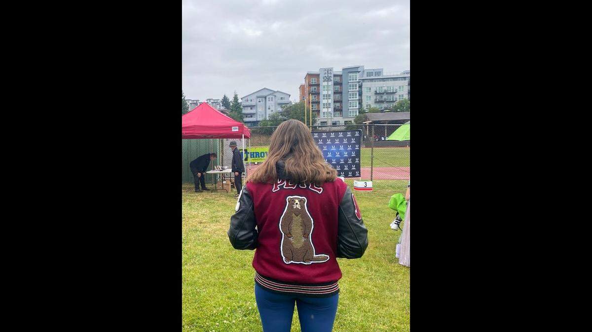 Spokane, Wash., North Central High School student Ivy Pete wears a letter jacket with a marmot on the back rather than the school mascot of an “Indian head.” Pete, who is Paiute, was a part of creating the Native mascot ban bill that took effect July 25.