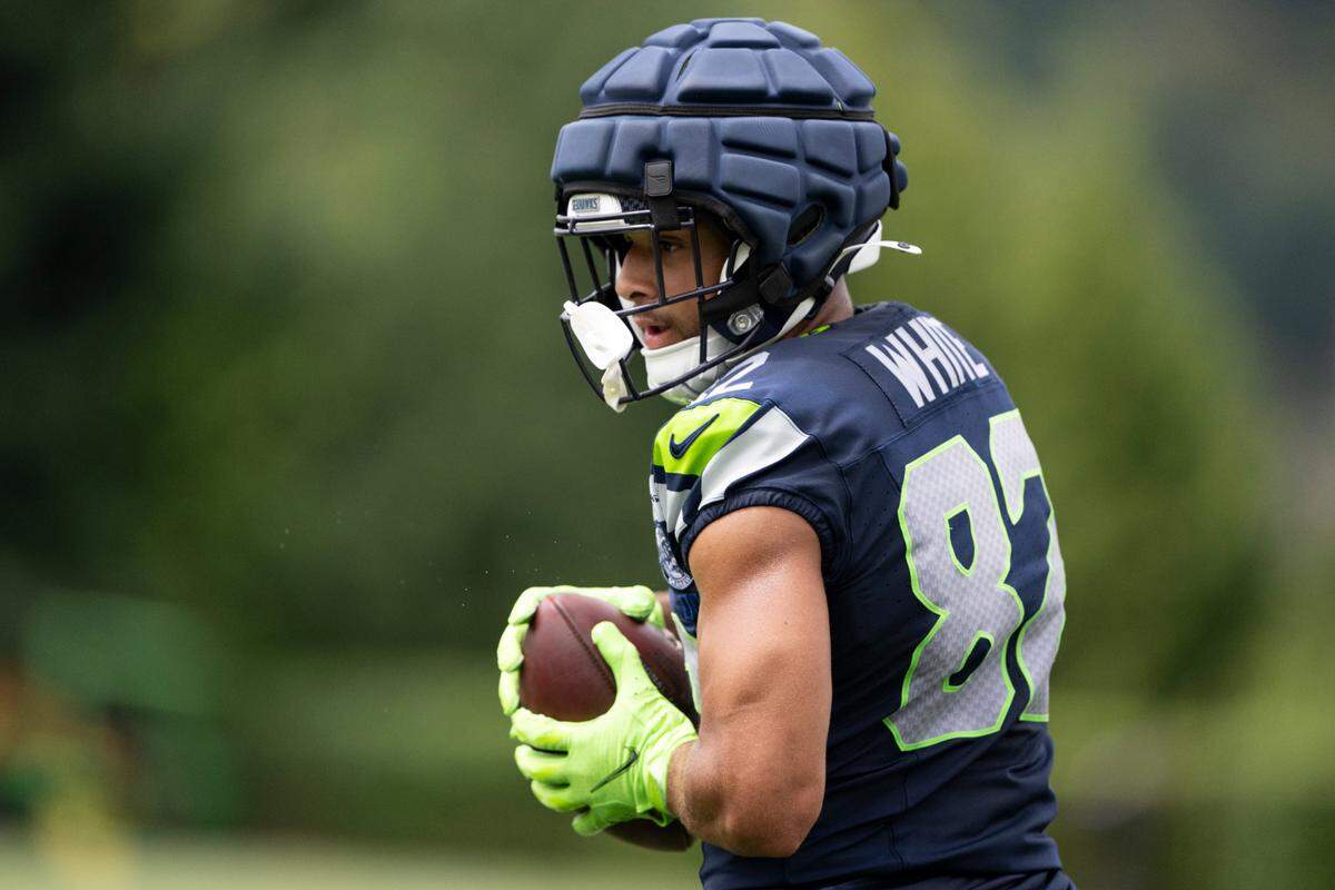 Seattle Seahawks wide receiver Cody White (82) makes a catch during training camp at Virginia Mason Athletic Center on Friday, July 25, 2025, in Renton, Wash.