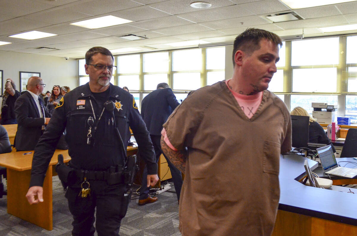 Kacy James Estes, 36, is escorted out of Pierce County Superior Court on Thursday, July 9, 2026, after being sentenced to 70 years, four months in prison for the June 26, 2022 murder of Alejandro Lloret and other offenses that stemmed from a gunfight in Tacoma.