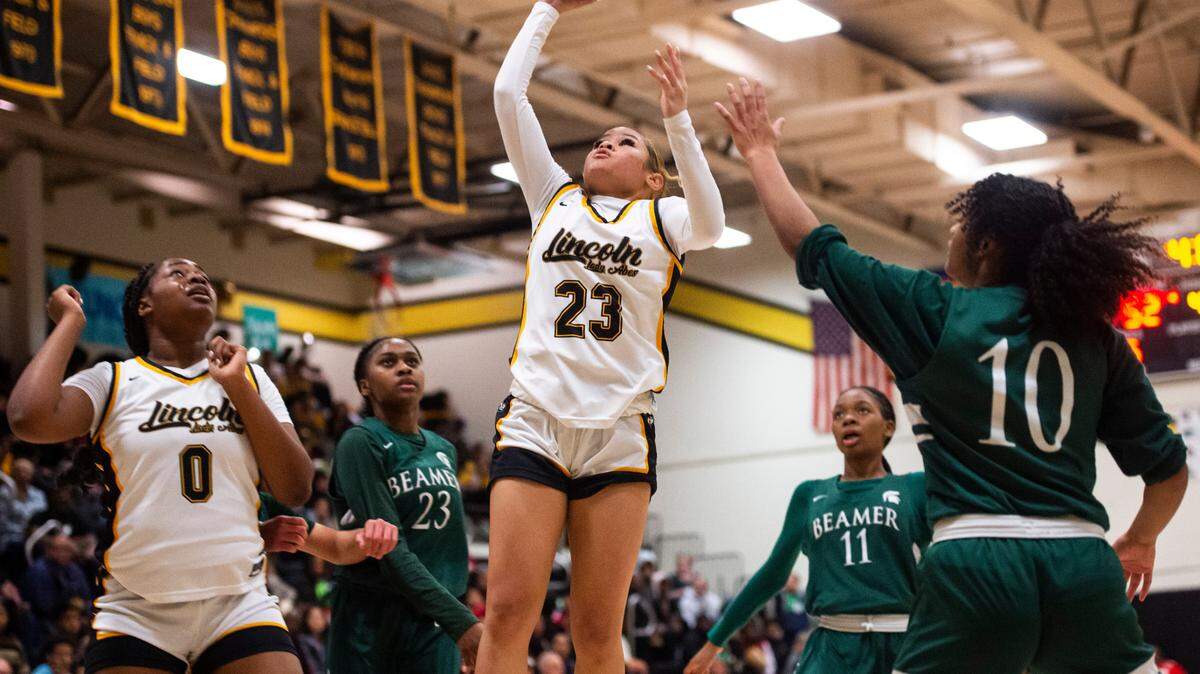 Lincoln guard Simani Thomas (23) takes a jump shot during a first round Class 3A West Central/Southwest district tournament game against Todd Beamer at Lincoln High School in Tacoma, Wash. on Feb. 10, 2023. Lincoln defeated Todd Beamer 55-28.