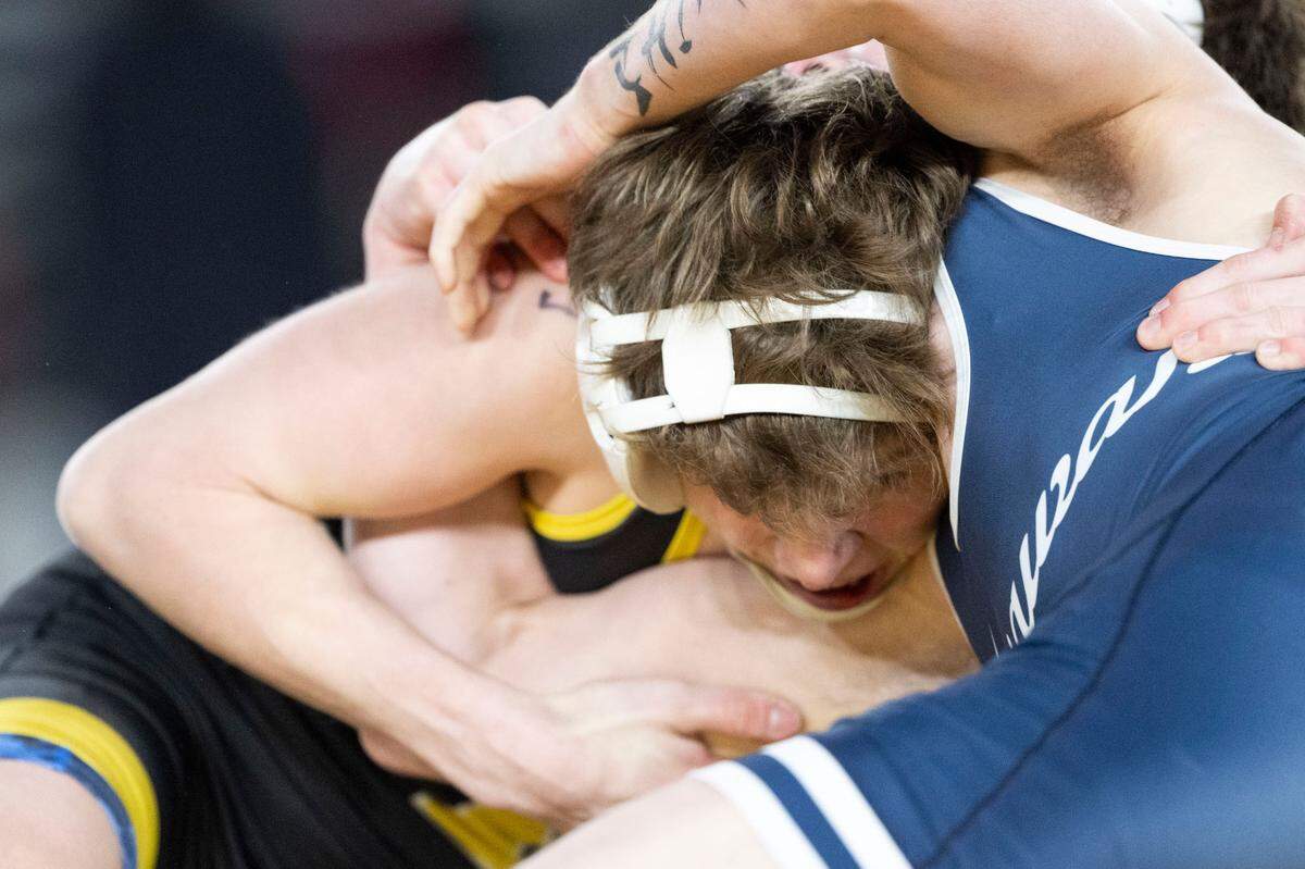 Tahoma’s Owen Marshall looks to take Chiawana’s Adrian Shima to the mat during their semifinal match in the Class 4A, 126-pound weight division on Friday, Feb. 21, 2025, at Mat Classic XXXVI at the Tacoma Dome in Tacoma.