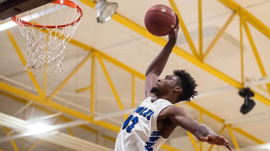 Federal Way’s Tari Eason (13) throws down a dunk in the second quarter. Kentridge played Federal Way in a basketball game at Enumclaw High School in Enumclaw, Wash., on Saturday, Feb. 2, 2019.