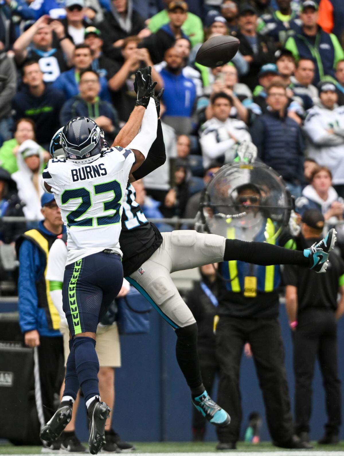 Seattle Seahawks cornerback Artie Burns (23) breaks up a pass intended for Carolina Panthers wide receiver Jonathan Mingo (15) during the second quarter of the game at Lumen Field, Sunday, Sept. 24, 2023, Seattle, Wash.