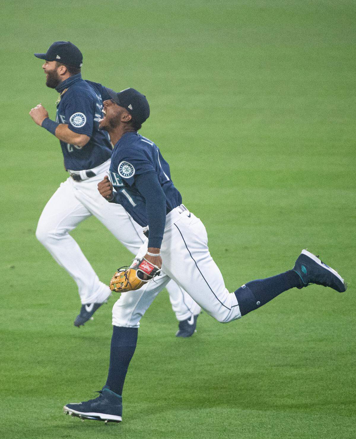 Seattle Mariners right fielder Kyle Lewis (1) celebrates after robbing a grand slam from Oakland Athletics right fielder Ramon Laureano (22) during the first inning. The Seattle Mariners played the Oakland Athletics in the second game of a Major League Baseball doubleheader at T-Mobile Park in Seattle, Wash., on Monday, Sept. 14, 2020.