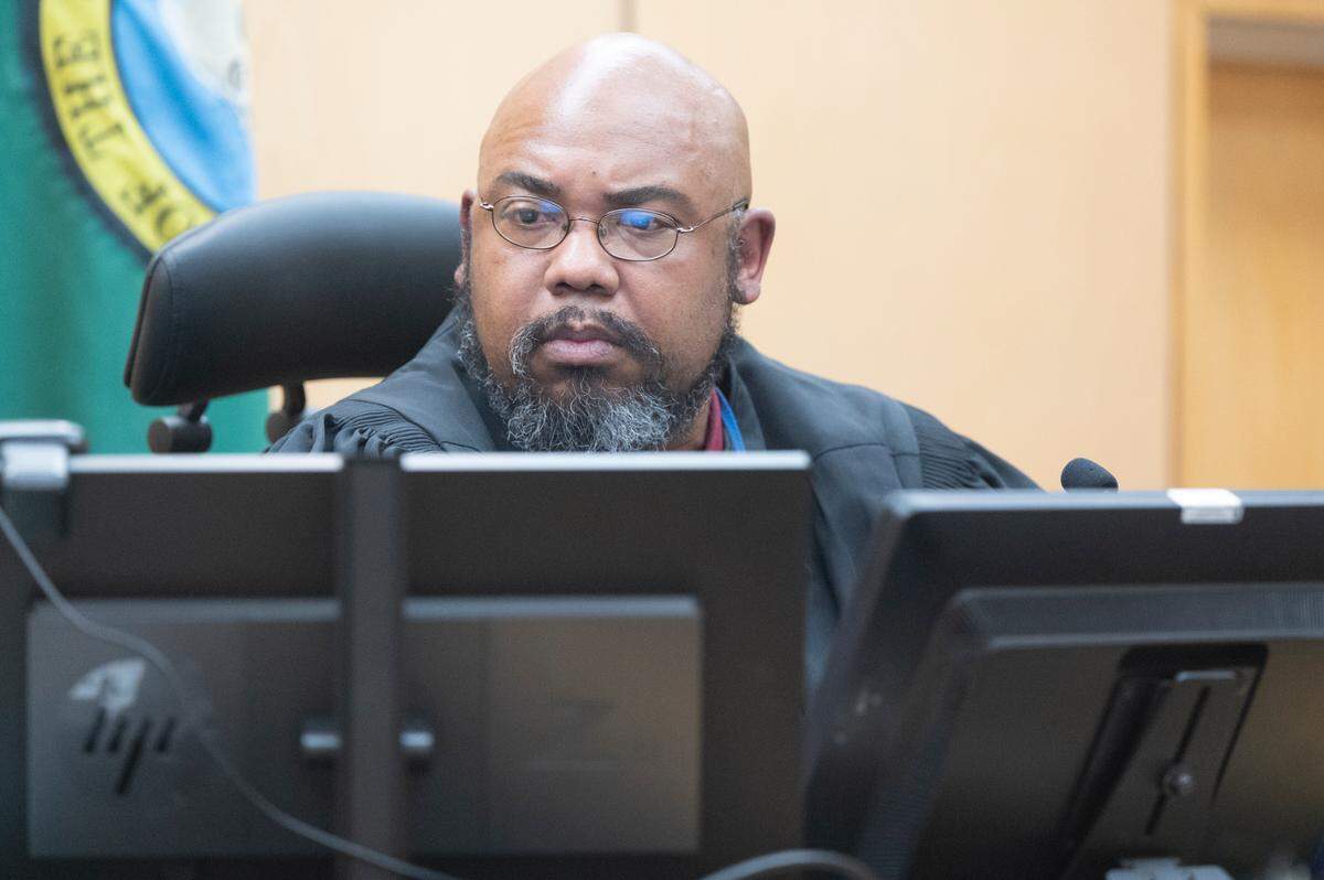 Judge Joseph Evans gives his decision in resentencing Kurtis William Monschke, not pictured, on Friday, June 27, 2025, at Pierce County Superior Court in Tacoma. Monschke was convicted of aggravated first-degree murder in 2003. His sentence of life without parole was declared unconstitutional in 2021 by the state Supreme Court.