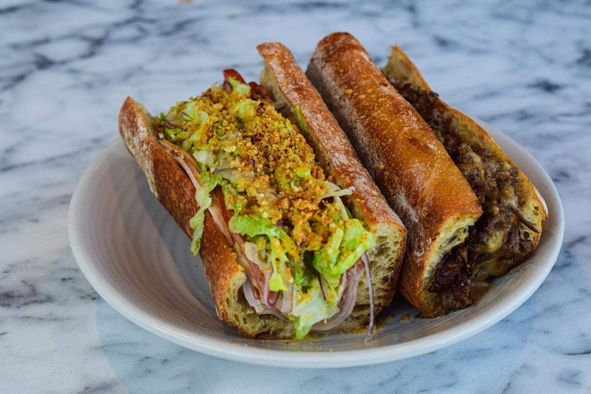 Sliced Tacoma offers thoughtful sandwiches and deli-style sides inside Museum of Glass, now also home to The Cat & Rabbitt’s Tacoma cake shop.