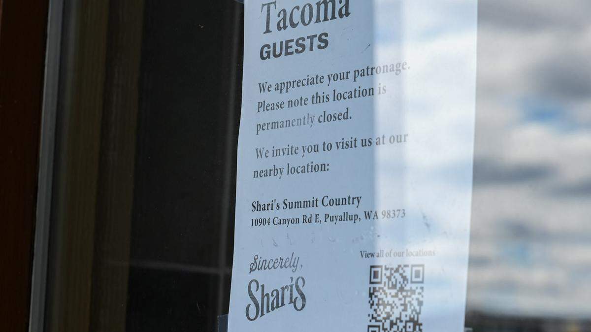 A sign informing guests of the permanent closure of the last Shari’s Cafe and Pies in Tacoma is posted in a window on Wednesday, July 24, 2024 in Tacoma.