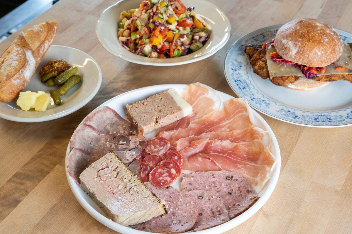 Not Bad, as they say, is pretty good. The plat de charcuterie features housemade beef tongue, chicken liver mousse, pork rillettes and pâté, served with French butter, sel de gris and baguette.
