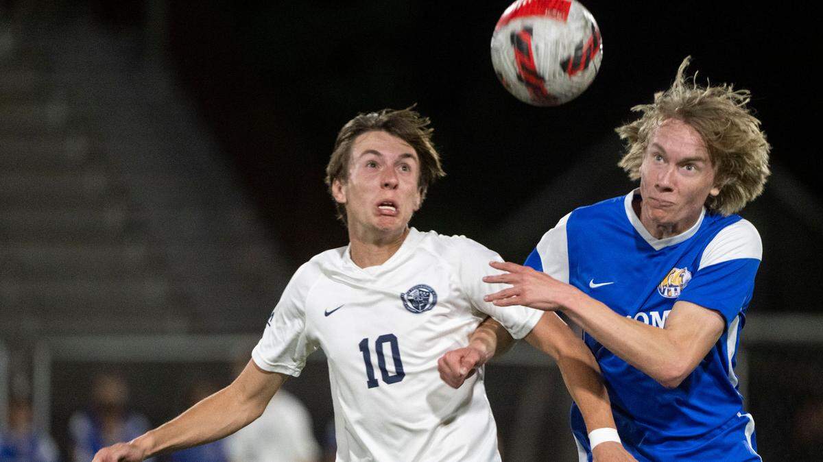 Tahoma’s Liam Stewart fights for positioning with Bellarmine Prep’s Dane Price as they try to gain possession of a loose ball in the second half of the 4A West Central/Southwest district soccer championship game on Thursday, May 11, 2023, at Sparks Stadium in Puyallup, Wash.