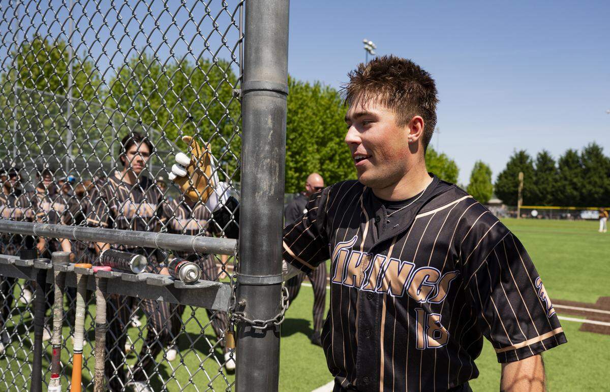 Puyallup’s Noah Benedict (18) comes off after hitting a 3-run homer against Moses Lake during the opening round of the 4A State tournament at Heritage Recreation Center, on Saturday, May 24, 2025, in Puyallup, Wash.