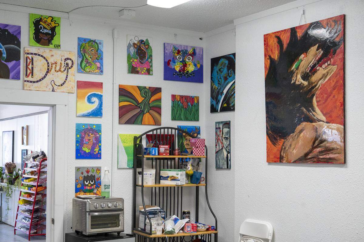 A conference room space at the back of Mattice Beauty Supply that hosts workshops and popups is decorated with artwork from previous workshops on Wednesday, Sept. 10, 2025, in Tacoma.