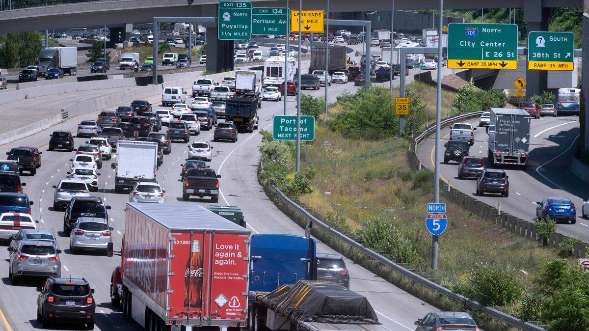 Northbound traffic makes its usual backup through the construction zone on Interstate 5 through Tacoma, Washington on Thursday, June 16, 2022.