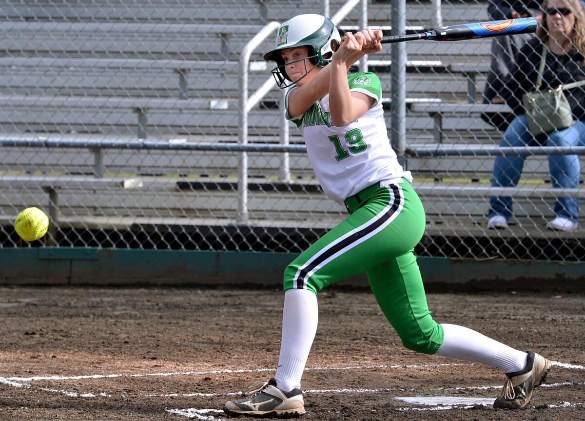 Tumwater’s Aly Waltermeyer watchers her hit down the third base line during the T-Birds’ April 27 home game against Centralia.