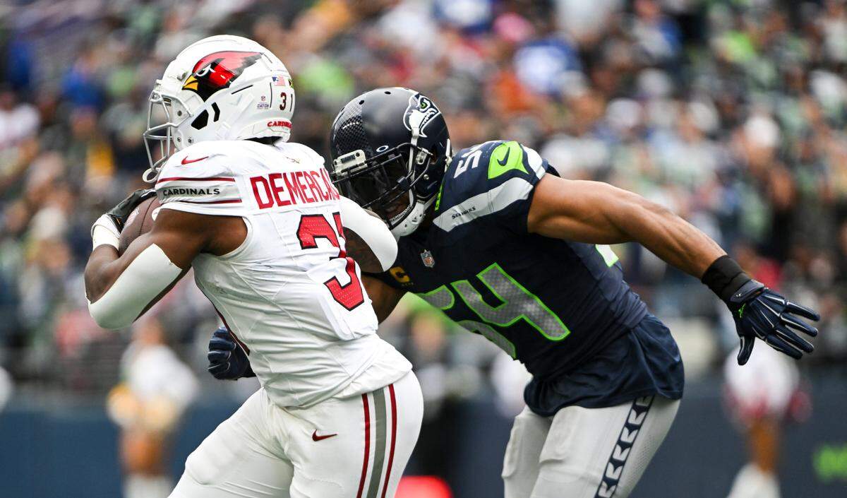 Arizona Cardinals running back Emari Demercado (31) evades Seattle Seahawks linebacker Bobby Wagner (54) during the second quarter of the game at Lumen Field, Sunday, Oct. 22, 2023, in Seattle, Wash.
