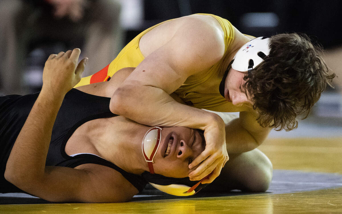 Orting’s Seth Dawkins wrestles Othello’s Arturo Solorio in the 2A 145 pound championship during day two of Mat Classic XXXII at the Tacoma Dome in Tacoma, Wash., on Saturday, Feb. 22, 2020.