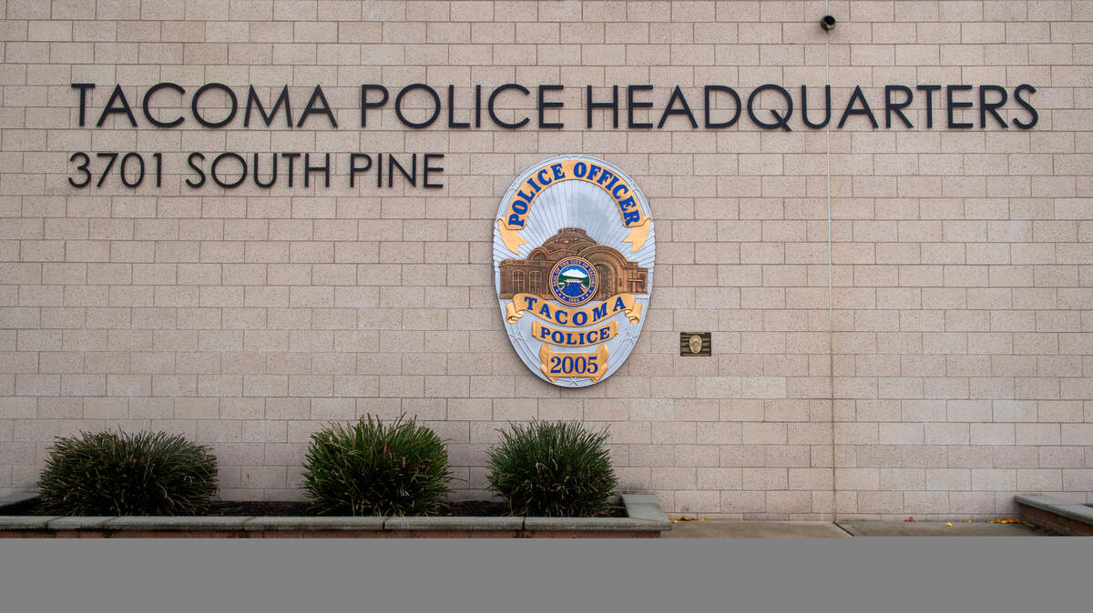 A large representation of an officer’s badge is displayed outside the front entrance of the Tacoma Police Department headquarters at 3701 S. Pine St. on Thursday, Nov. 26, 2020.