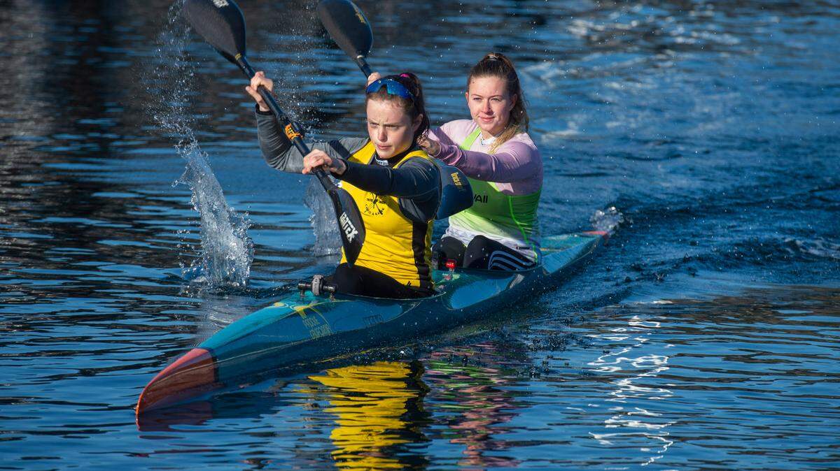 Kali Wilding and Elena Wolgamot, left, are training with the Gig Harbor Canoe and Kayak Club in a two-man sprint kayak and will compete in trials next month for the U.S. Olympic team. Photo taken at Jerisich Dock in Gig Harbor Thursday, March 11.