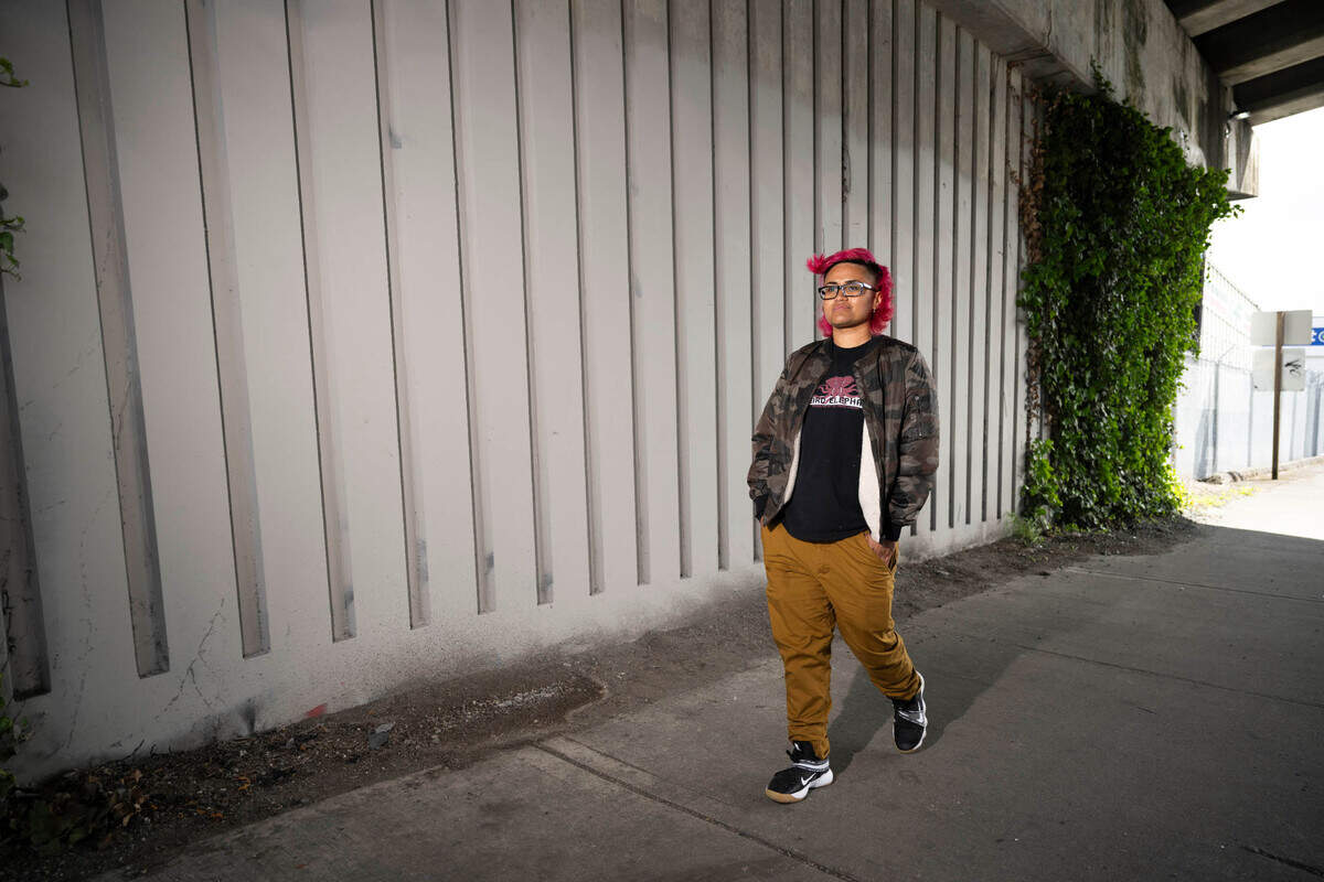 Muralist Nofo Porter poses for a portrait at the future site of a mural on the Union Avenue overpass on South Tacoma Way, on Thursday, May 16, 2024, in Tacoma.