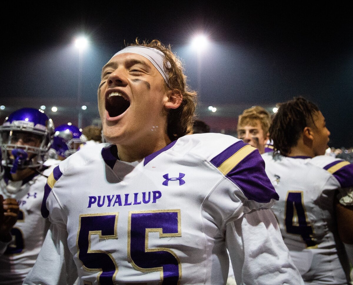 Puyallup’s Ben Schumock (55) lets out a yell as Puyallup players celebrate their win against Mount Si. Puyallup played Mount Si in a football game at Mount Si High School in Snoqualmie, Wash., on Friday, Nov. 16, 2018.