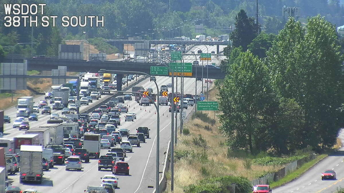A vehicle caught fire Wednesday morning on southbound Interstate 5 in Tacoma, according to the Washington State Department of Transportation, blocking several lanes of traffic while emergency crews responded.