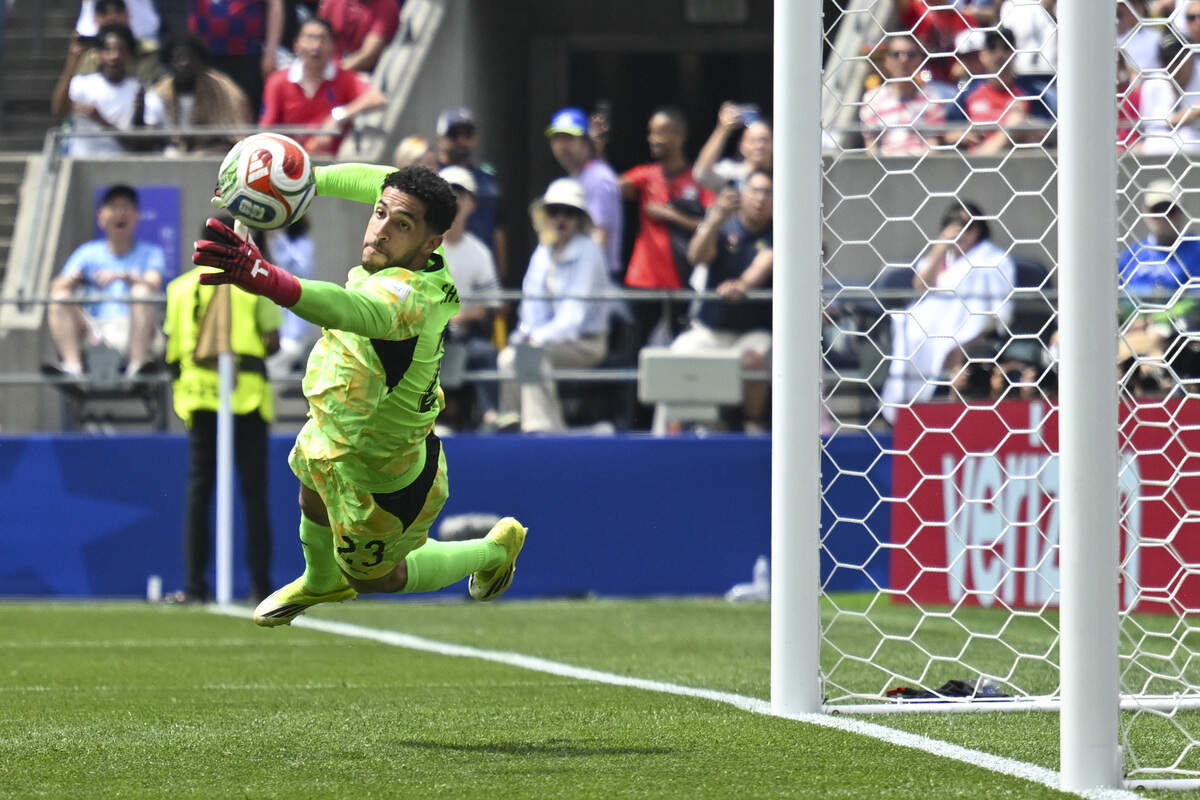 Egypt goalkeeper Mostafa Shoubir (23) dives to block a shot on goal by Belgium on Monday, June 15, 2026, during a FIFA World Cup game in Seattle, Wash.