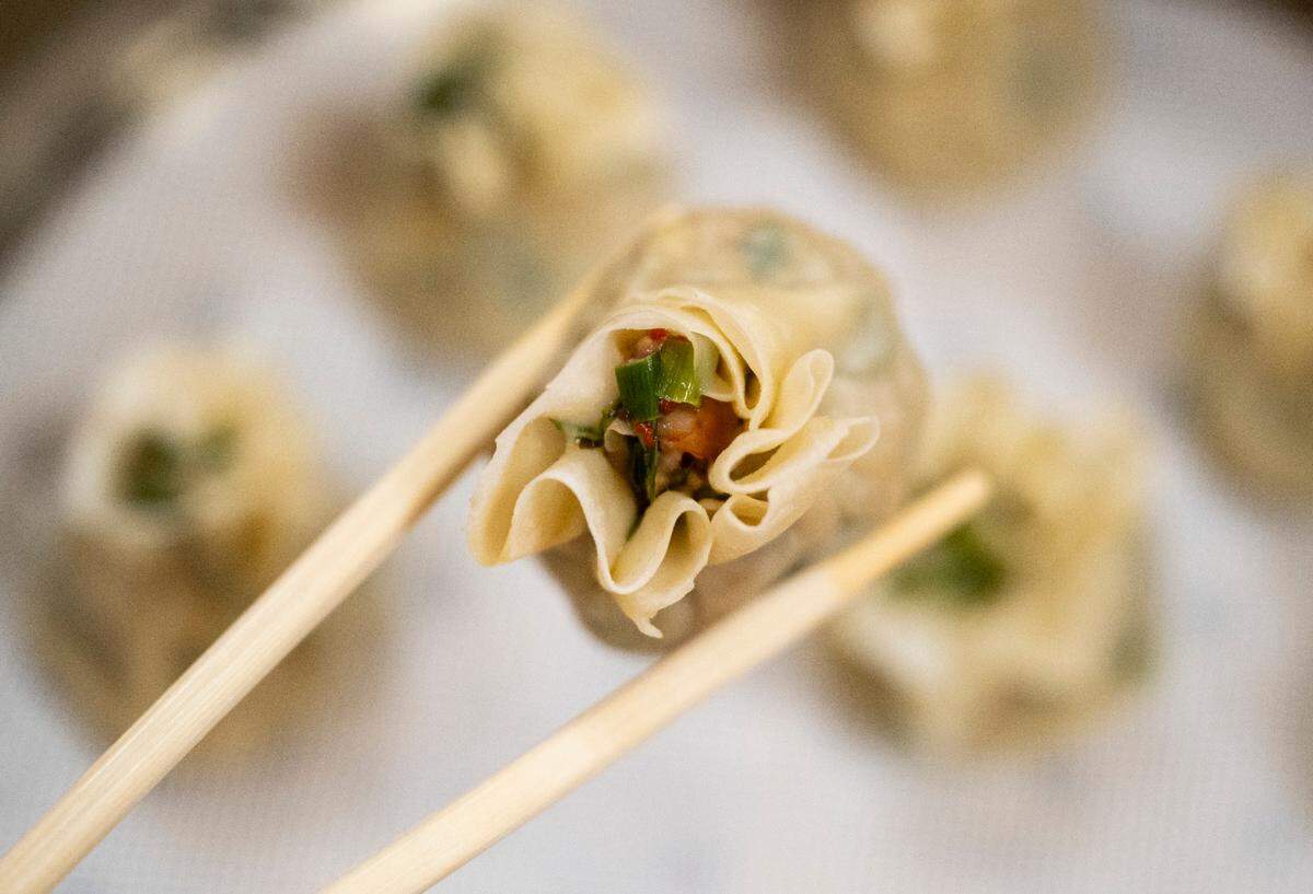 The shaomai, MyungIn’s version of a traditional Chinese soup dumpling, is another must-try. Pour a small spoon of the provided soy-and-spices sauce to create the optimal flavor pop.