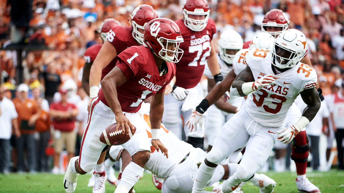 FILE - In this Oct. 6, 2018, file photo, Oklahoma quarterback Kyler Murray (1) scrambles against Texas during the first half of an NCAA college football game at the Cotton Bowl in Dallas. The Sooners face Texas in the Big 12 championship game on Saturday. (AP Photo/Cooper Neill, FIle)