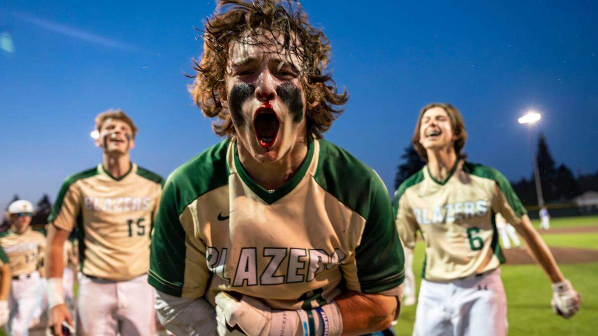 Timberline’s Gage Reeser celebrates after his game-winning single in the bottom of the seventh inning helped the Blazers to a 7-6 come-from-behind win in the 3A West Central/Southwest district baseball championship game at Auburn High School on Saturday, May 13, 2023, in Auburn, Wash.