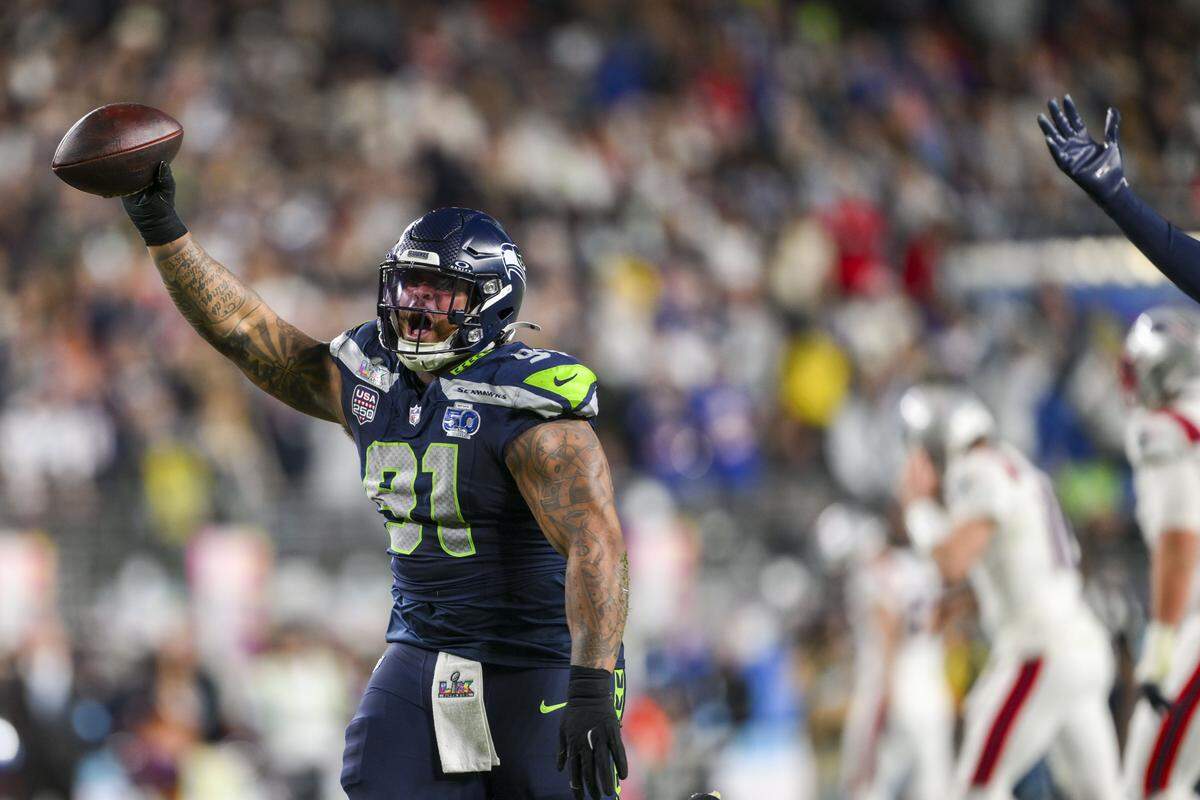 Seattle Seahawks defensive tackle Byron Murphy II (91) celebrates after a fumble recovery during the third quarter of Super Bowl LX at Levi's Stadium on Feb. 8, 2026 in Santa Clara, Calif.
