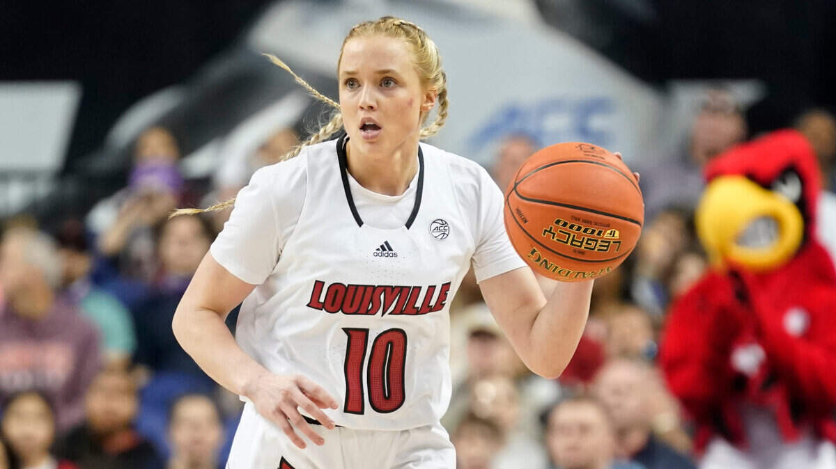Louisville guard Hailey Van Lith (10) brings the ball up court against Virginia Tech during the first half of an NCAA college basketball game for the Atlantic Coast Conference Tournament championship in Greensboro, N.C., Monday, March 6, 2023. (AP Photo/Chuck Burton)