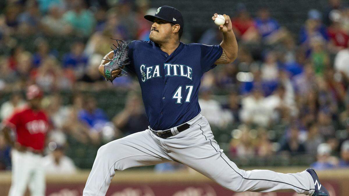 Seattle Mariners relief pitcher James Pazos (47) delivers a pitch during the tenth inning of a baseball game against the Seattle Mariners, Monday, August 6, 2018, in Arlington, Texas. (AP Photo/Sam Hodde)