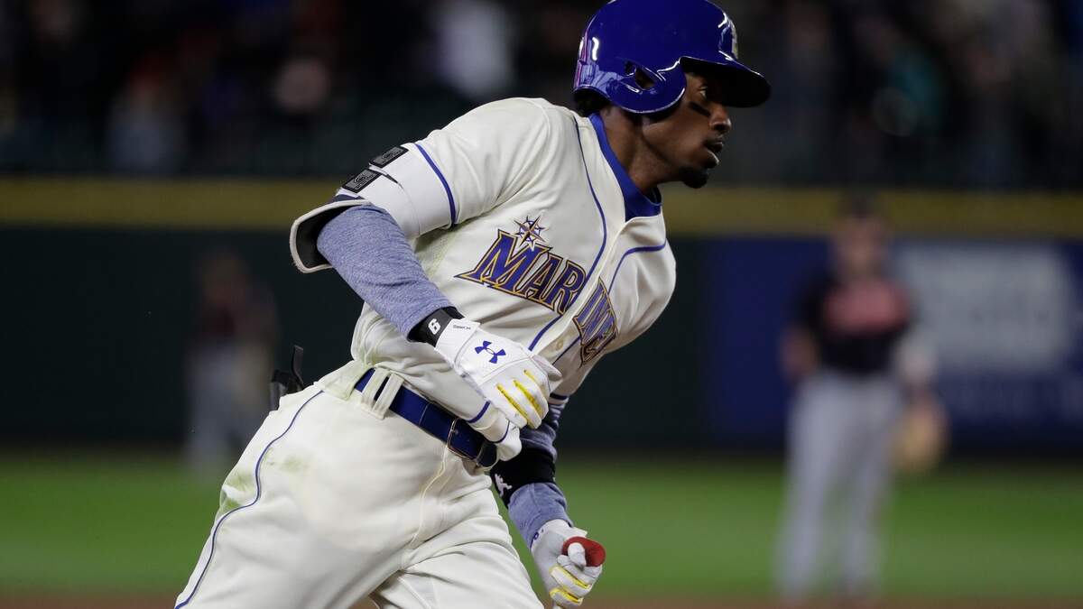 Seattle Mariners' Dee Gordon rounds the bases after hitting a home run against the Cleveland Indians during a baseball game, Sunday, April 1, 2018, in Seattle. (AP Photo/Ted S. Warren)