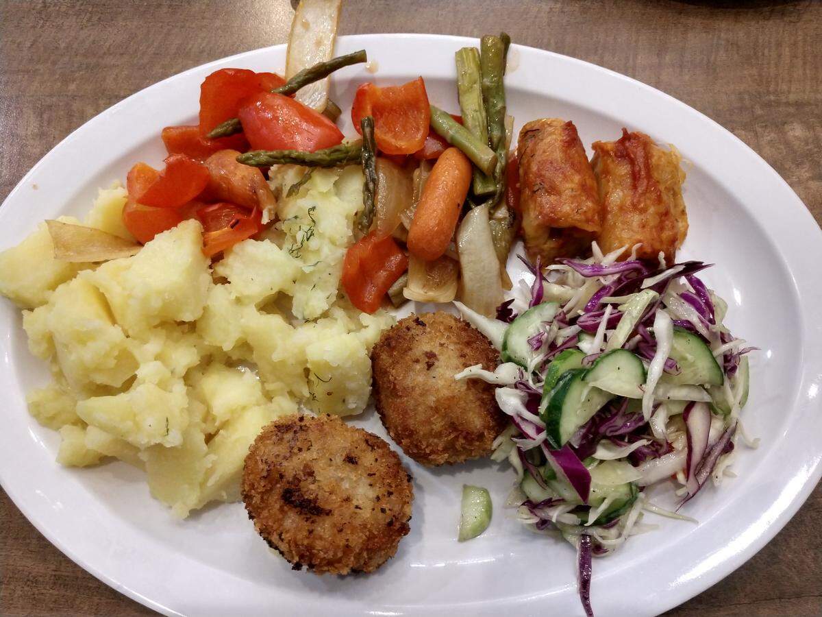 Ukrainian kotleti meatballs (front), plus cabbage salad on the right, cabbage rolls, sauteed vegetables and mashed potatoes from Marvel Bay Cafe in Parkland.