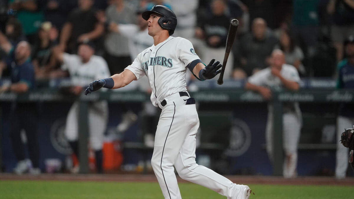 Seattle Mariners’ Dylan Moore watches his grand slam during the eighth inning of a baseball game against the Houston Astros, Monday, July 26, 2021, in Seattle. (AP Photo/Ted S. Warren)
