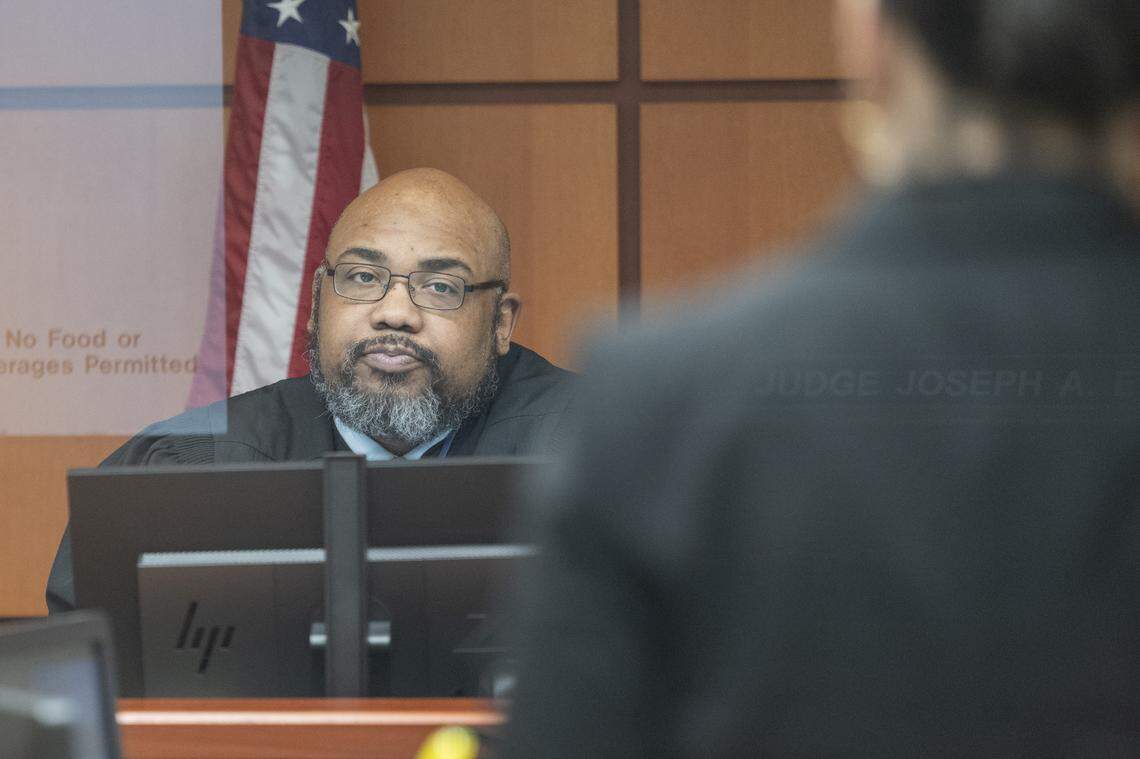 Judge Joseph Evans oversees an arraignment for Majeed Guerry on Wednesday, April 22, 2026, at Pierce County Superior Court in Tacoma, Wash. Guerry, 31, has been charged with four counts of assault with a firearm for opening fire inside of the Brass Lantern in 2025.