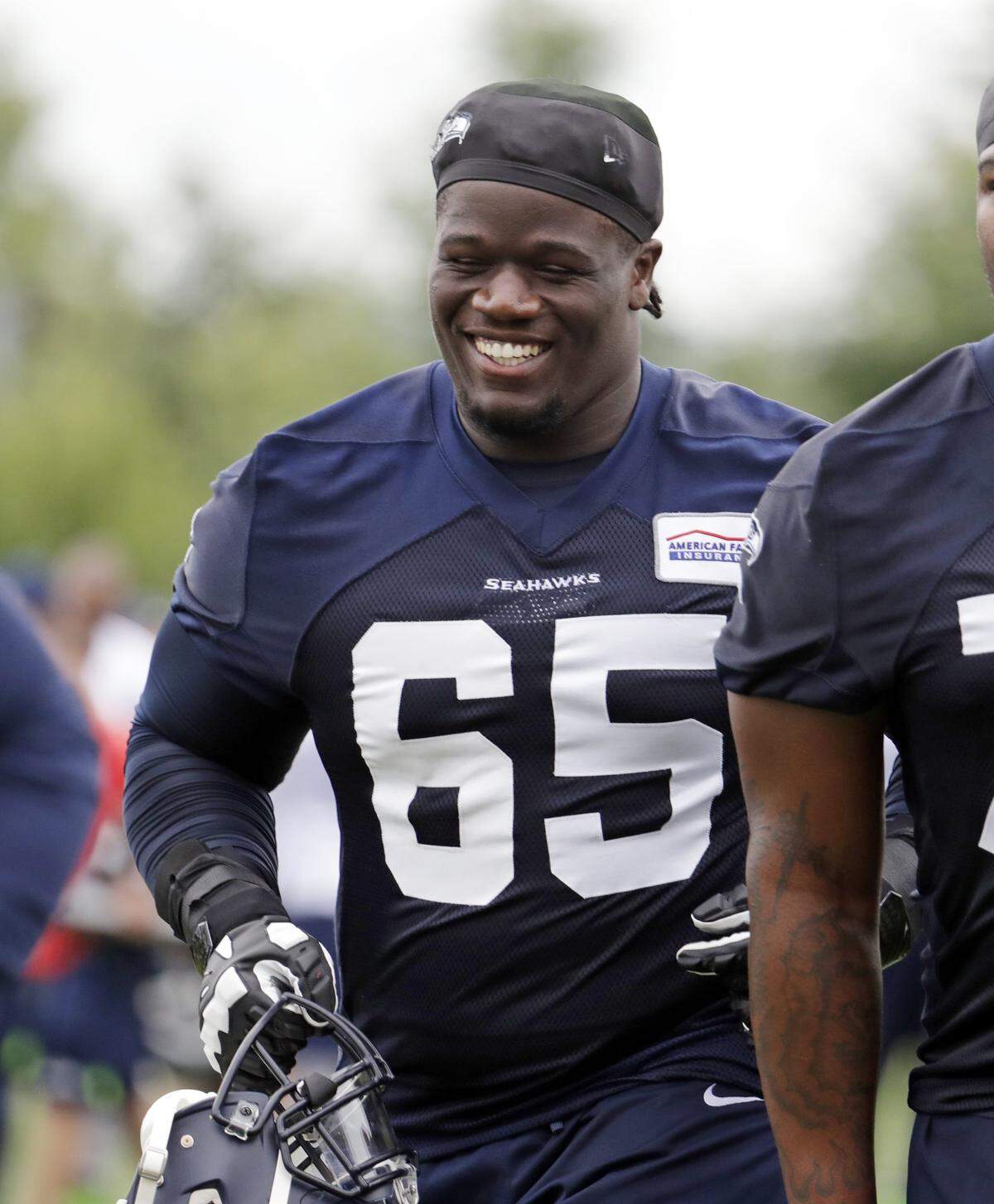 Germain Ifedi was smiling again late Friday night after he answered calls for his job by performing the best he has in a while. He solidified his hold on the starting right-tackle job over debuting George Fant in the Seahawks’ third preseason game, at Minnesota.
