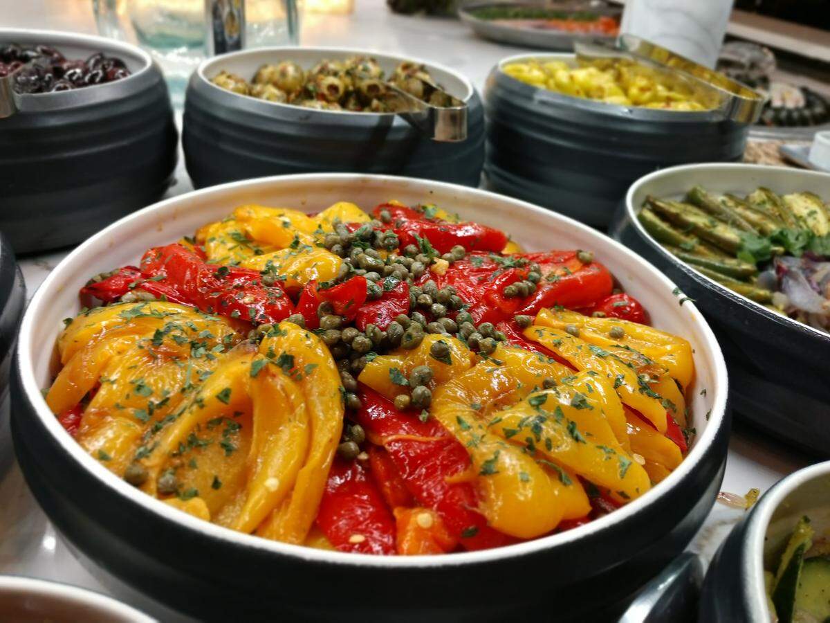 Roasted peppers, olives and more on the cold bar at Tacoma’s Texas de Brazil.