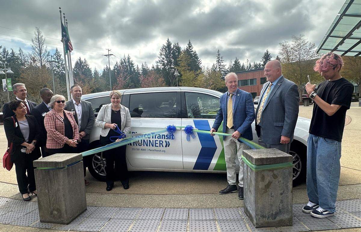 Gig Harbor Mayor Tracie Markley cuts the ribbon to celebrate Pierce Transit’s Gig Harbor Runner April 1, 2024.