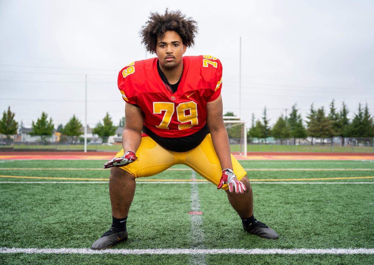 Mount Tahoma varsity football offensive lineman Marquise Thorpe-Taylor poses for a portrait on the field at Mount Tahoma High School in Tacoma, Wash. on Oct. 5, 2022.