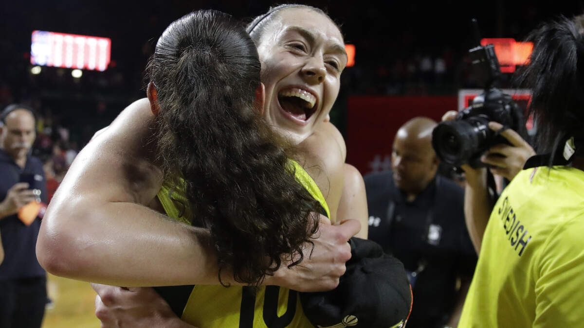 Seattle Storm forward Breanna Stewart (30) hugs teammate Sue Bird (10) after winning Game 3 of the WNBA basketball finals Wednesday in Washington D.C. The Storm defeated the Washington Mystics 98-82 and won their third WNBA title.