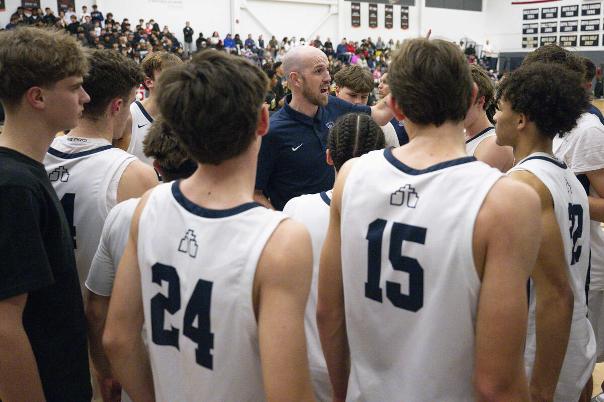 Bellarmine head coach Bobby Moorehead huddles with players before a game against Lincoln on Wednesday, Jan. 28, 2026, in Tacoma.